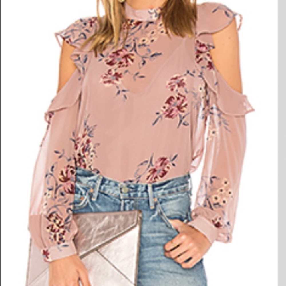Beautiful flowy blouse with shoulder cut outs